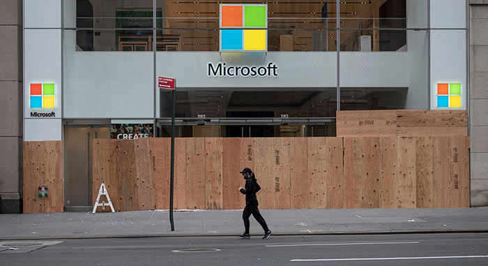 Microsoft to close physical stores, takes $450m hit